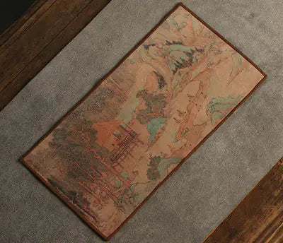 Decorative rug with artistic design on a gray floor