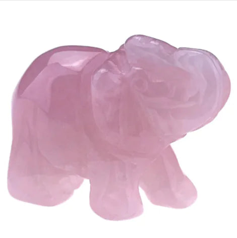 Pink elephant figurine on a white background
