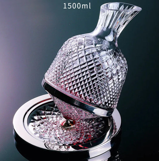 Crystal fish-shaped decanter with diamond pattern on a dark background