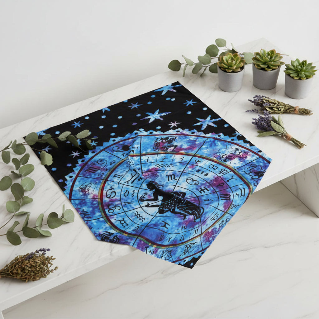 Colorful tie-dye patterned fabric with star designs on a black background