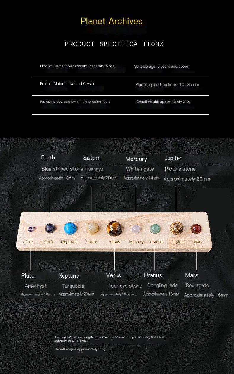 Solar system planetary model with colored stones on a black background