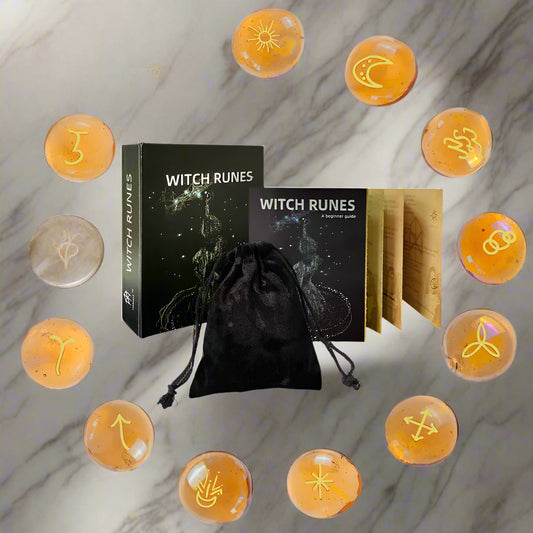 Witch Runes set with stones, books, and a drawstring bag on a white background