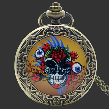 Decorative pocket watch with a skull and floral design on a white background