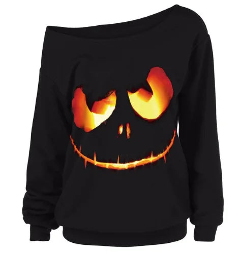 Black sweatshirt with a pumpkin face design on a white background