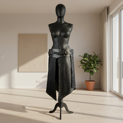 Black leather kilt with metal studs and belt on a white background