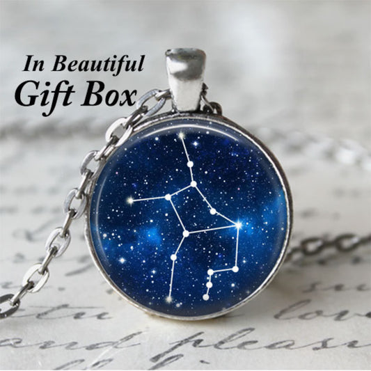 Star constellation pendant necklace on a textured surface with text overlay.