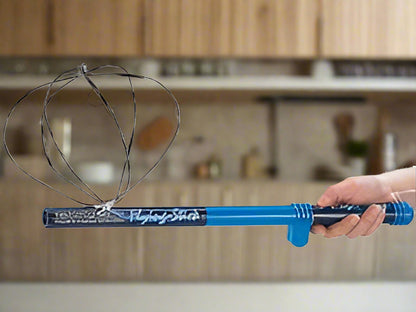 Blue toy wand held by a hand against a white background