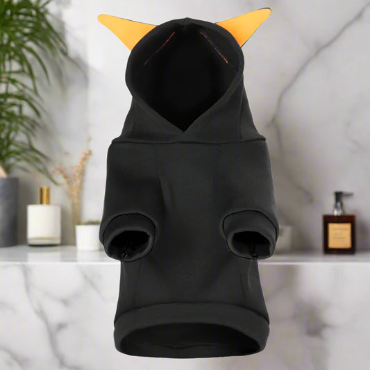 Black pet hoodie with yellow horns on a white background