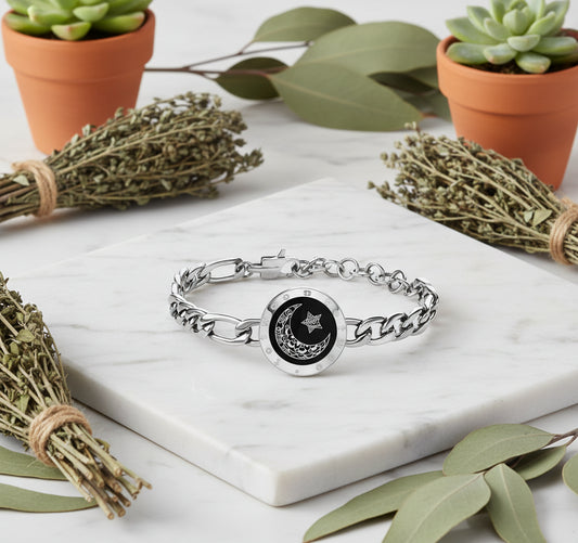 Two chain bracelets with circular charms featuring celestial designs on a white background.