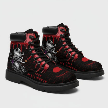 Black and red high-top sneakers with skull design in a box
