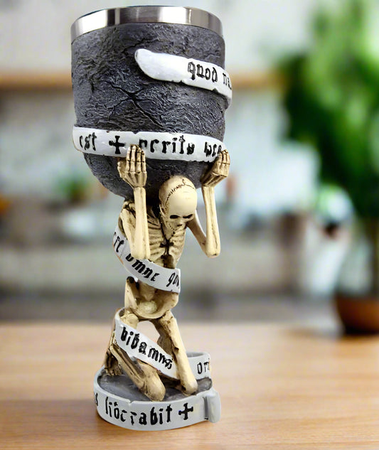 Statue of a skeleton holding a cup with text bands on a white background