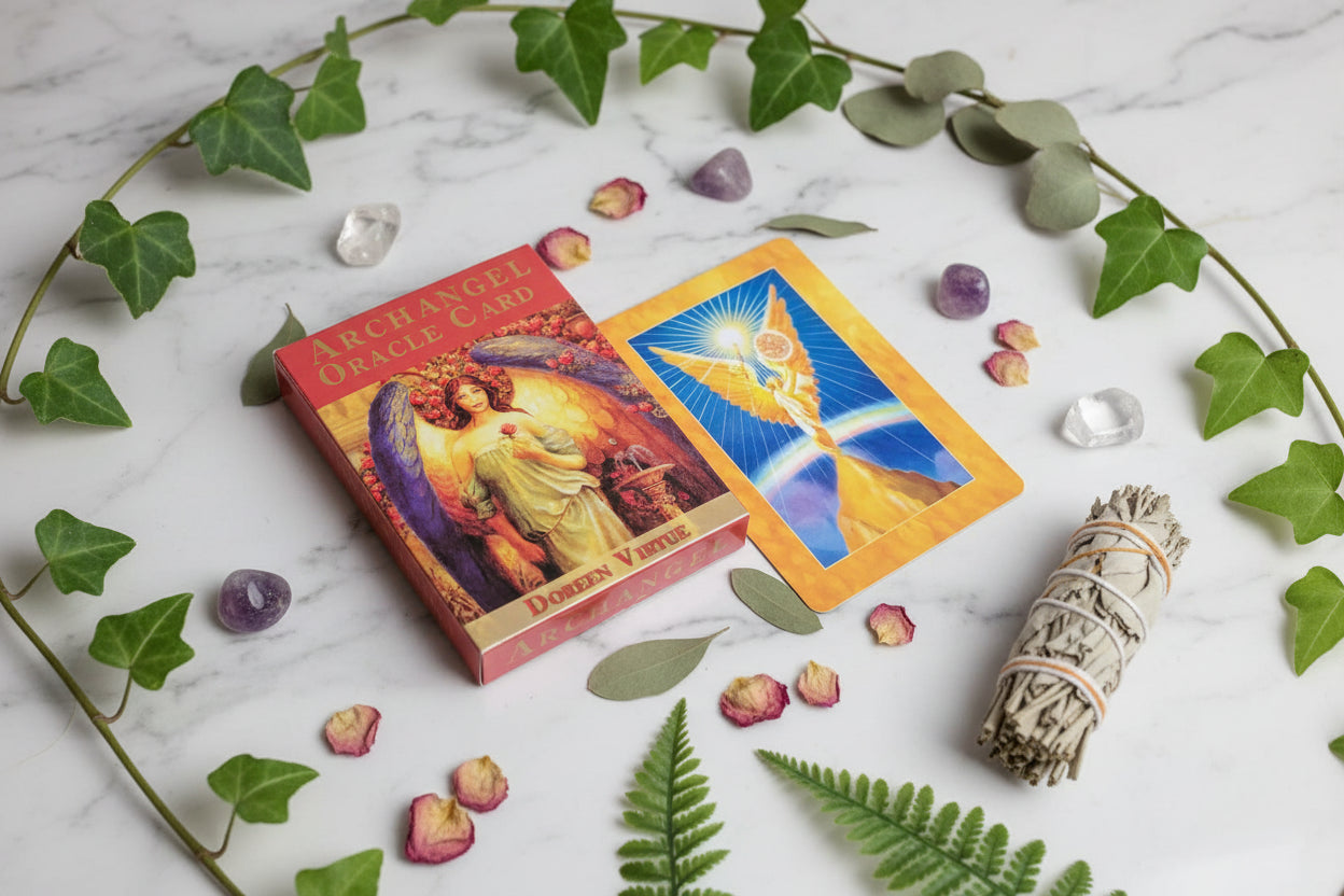 Archangel Oracle Cards with a card featuring an angel and rainbow on a white background