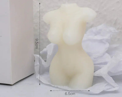 White female torso-shaped candle with measurements and text on a white background