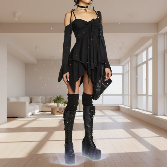 Black dress with long sleeves and cut-out shoulders, paired with black knee-high boots on a white background.