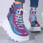 Colorful high-top sneakers on a plain background