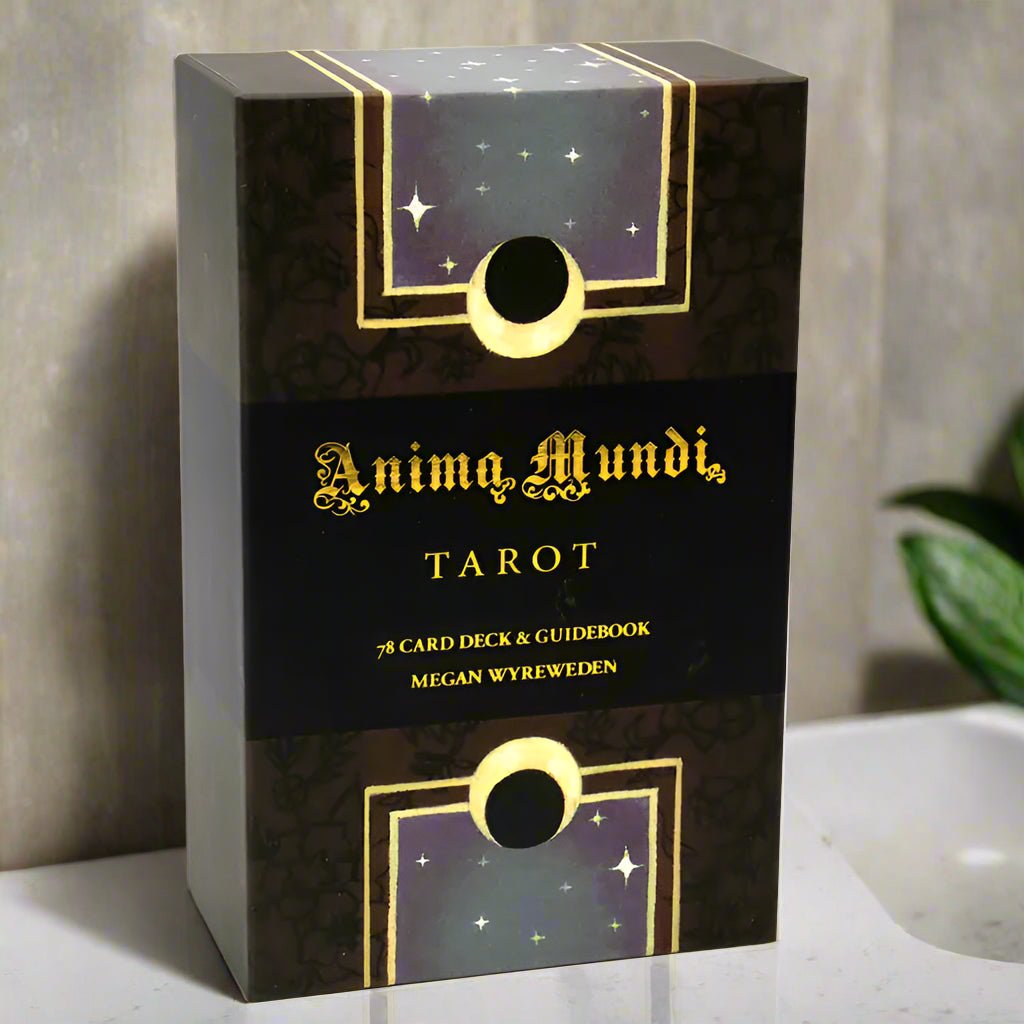 Box of Anima Mundi Tarot with gold and black design