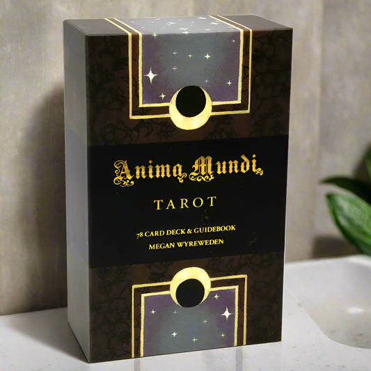 Box of Anima Mundi Tarot with gold and black design