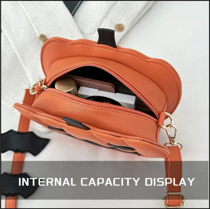 Orange handbag with open top showing internal capacity on a white background