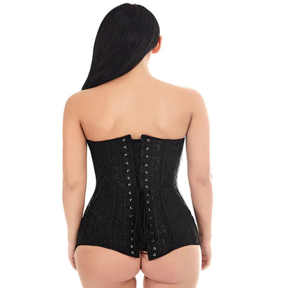 Black corset worn by a model on a white background