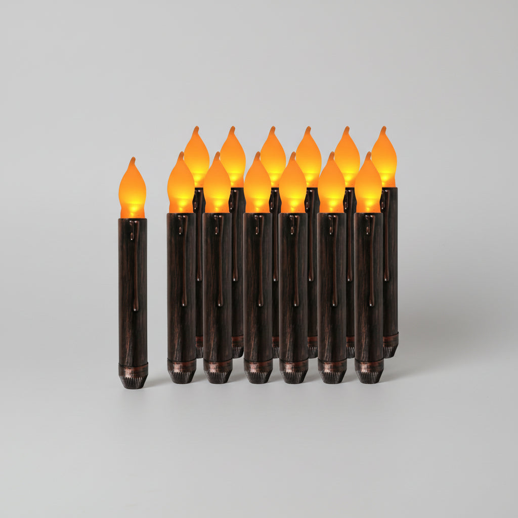 Row of decorative lights with orange bulbs on a white background