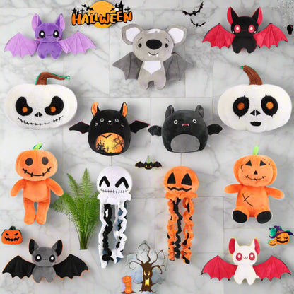 Collection of Halloween-themed plush toys including pumpkins, bats, and ghosts on a white background.