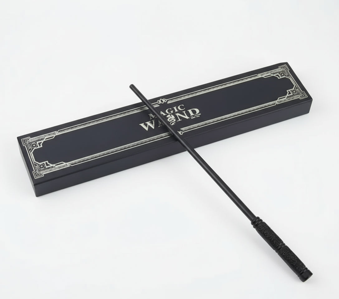 Black magic wand with decorative packaging on a white background